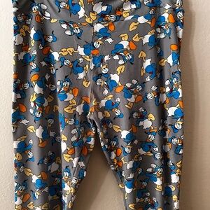 LuLaRoe Gray Leggings with Blue and Orange Cartoon Print